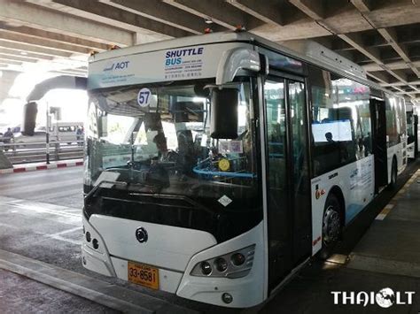 interior of free shuttle bus from DMK to BKK with passengers and luggage