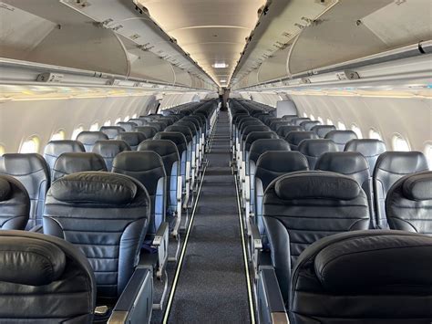Interior of Spirit Airlines cabin showing tight seating configuration