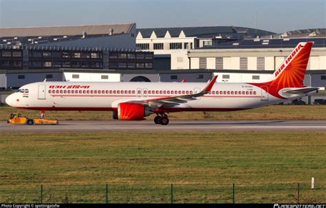 interior view of air india a321neo showing emergency equipment signage