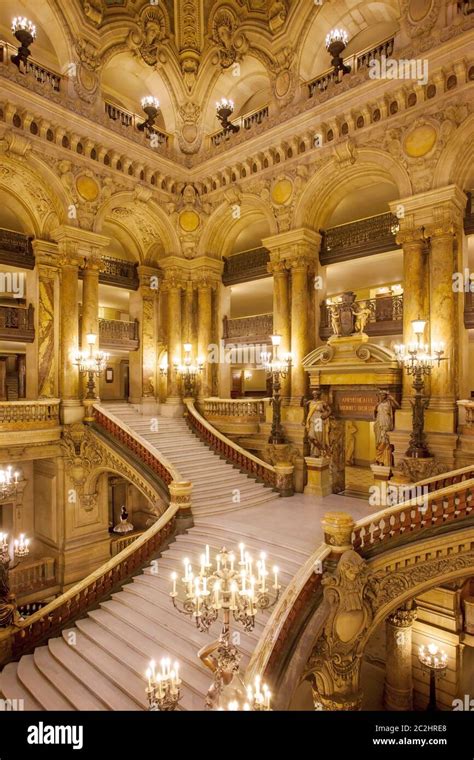 Interior view of Palais Garnier opera house with ornate golden decorations