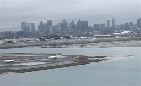 international arrivals delayed at Boston Logan Airport during June 2025 storm impact