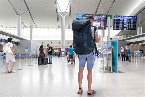 international tourists arriving at Noi Bai International Airport in Hanoi during summer peak
