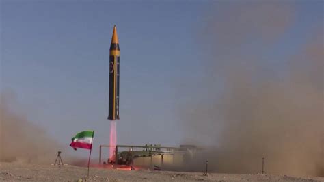 Iranian ballistic missile launch test with desert backdrop