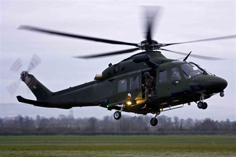 Irish Air Corps AW139 helicopter in flight over Dublin cityscape