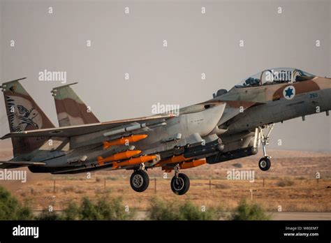 Israeli F-15I Ra’am with desert camouflage in flight over the Negev Desert
