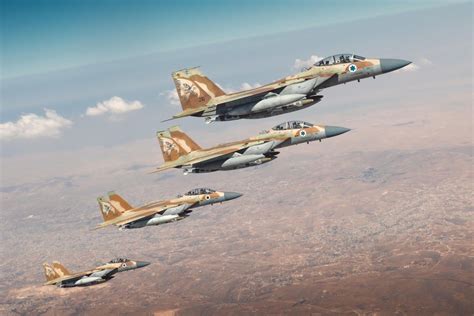 Israeli fighter jet mid-flight over desert near Tehran border