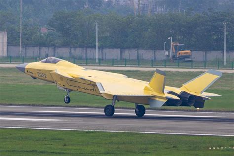 j-36 stealth fighter prototype taxiing on runway with j-10c escort