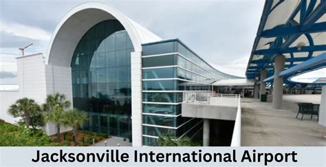 Jacksonville International Airport terminal with palm trees and entrance walkway