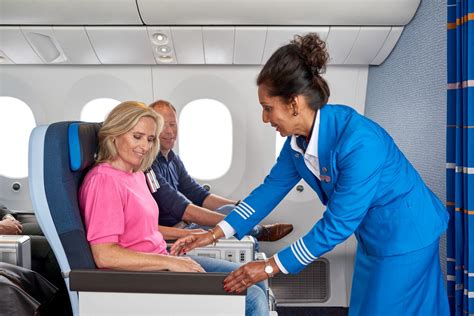JAL cabin crew serving passengers
