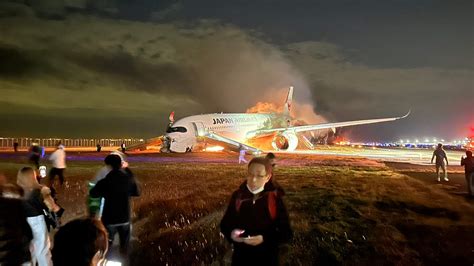 japan airlines airbus a350 emergency evacuation at haneda airport night incident