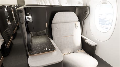 Japan Airlines Safran Unity business class suite sliding door minimalist cabin lighting
