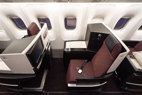 Japan Airlines Sky Suite fully flat business class bed with premium bedding
