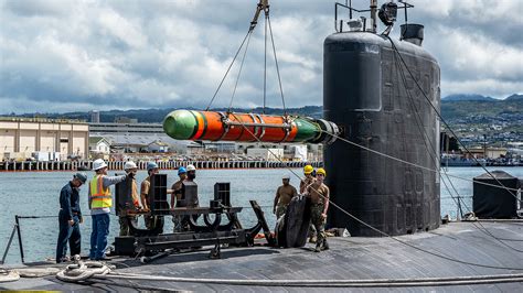 Japanese Type 18 heavyweight torpedo loaded into submarine torpedo tube