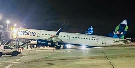 jetblue crew assisting travelers at San Juan airport during disruption recovery
