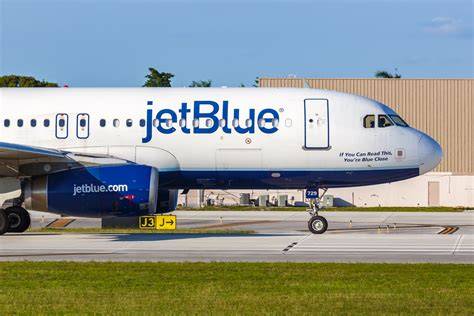 JetBlue Spirit Airlines merger proposal aircraft at US airport