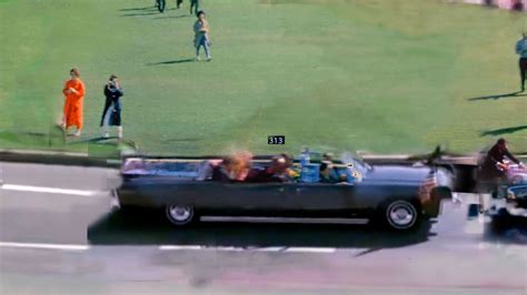 JFK limousine turns from Houston onto Elm in Dealey Plaza moments before shooting