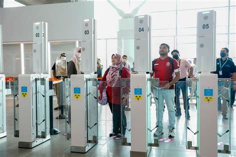 journalists boarding airasia flight at klia2 for regional assignment under hawana campaign