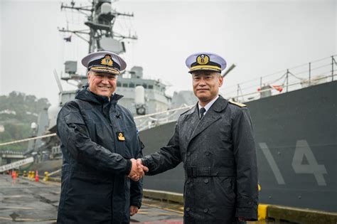 Judith Collins inspecting Royal New Zealand Navy personnel during naval parade ceremony