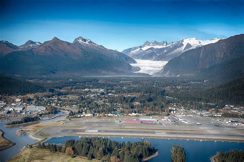 Juneau International Airport Alaska night approach surrounded by mountains and Gastineau Channel
