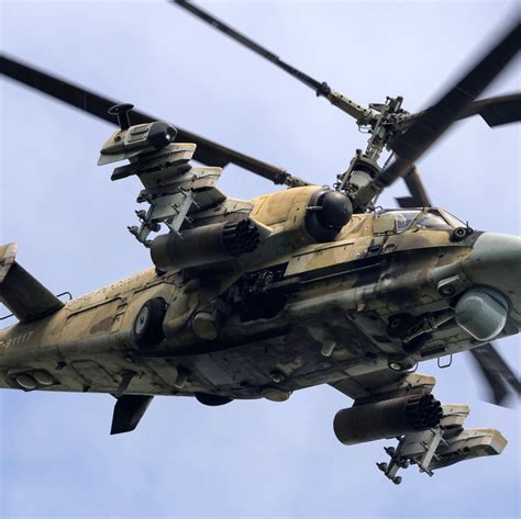 Ka-52 helicopter banking at low altitude during combat exercise in Russia
