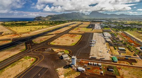 Kauai Lihue airport tropical runway with Southwest aircraft arriving