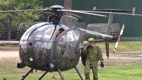 Kawasaki-built OH-6 Cayuse performing training exercises with Japanese Ground Self-Defense Force