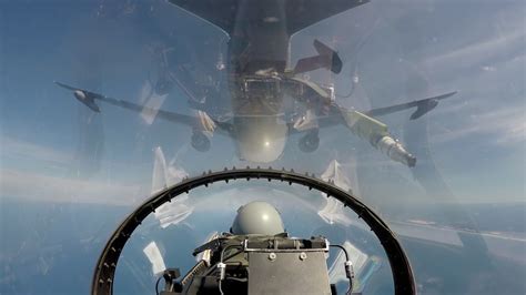 KC-46 Pegasus refueling F-16 fighter boom operator cockpit