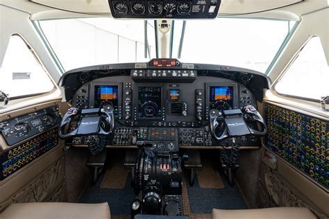 King Air cockpit with pilot instruments illuminated during night flight