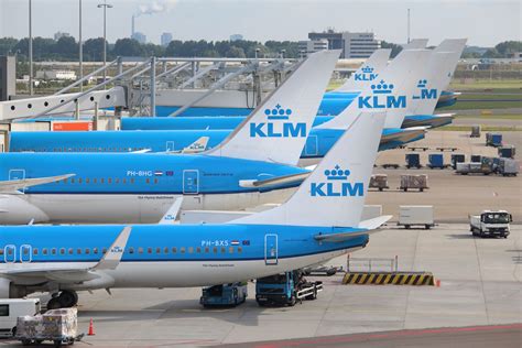 KLM aircraft at Schiphol Airport with flight alert status to the UAE