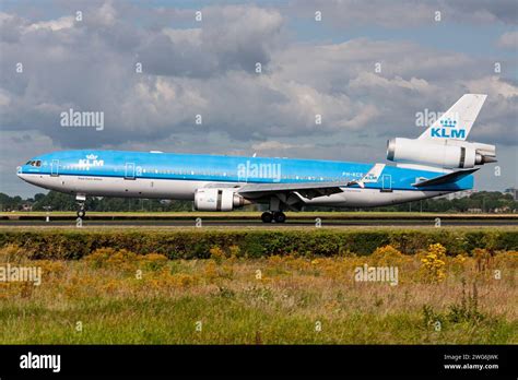 KLM McDonnell Douglas MD-11 passenger aircraft landing at Amsterdam Schiphol Airport