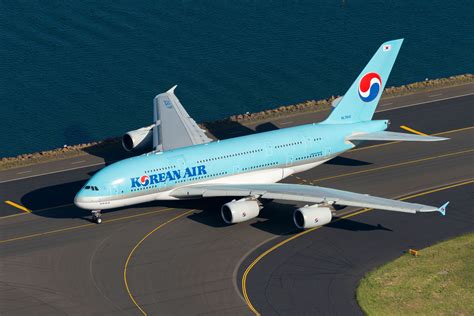 korean air airbus a380 taxiing at incheon airport at sunrise