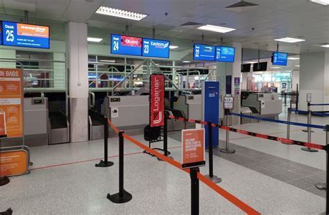 Korean Air check-in desk with multilingual signage in Atlanta terminal