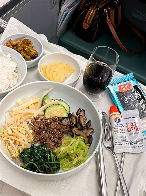 Korean Air in-flight meal featuring the signature bibimbap dish