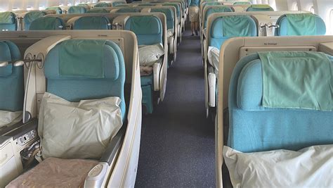 Korean Air Prestige Class seat converting into a flat bed