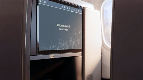 Korean Air Prestige Class suite with lie-flat seat and large entertainment screen