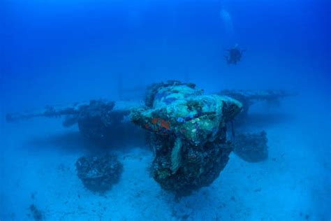 Kwajalein Atoll underwater World War II aircraft coral covered wrecks
