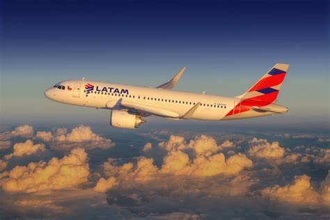 latam airlines aircraft with latam pass livery over south american airport