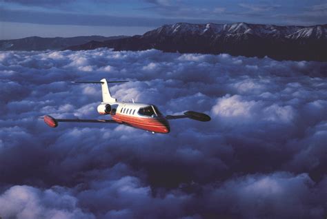 Learjet 25D profile view with wingtip fuel tanks and extended fuselage