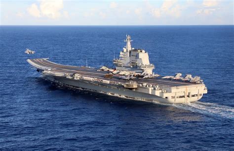 Liaoning and Shandong Chinese aircraft carriers maneuvering together in the western Pacific