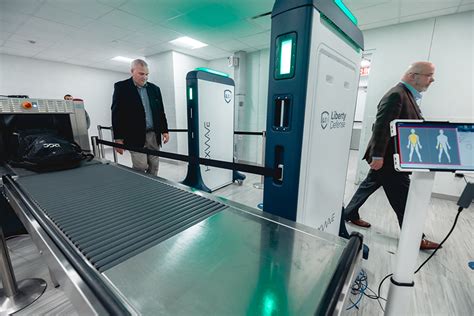 Liberty Defense HEXWAVE radar screening system airport precheck multi person scanning installation