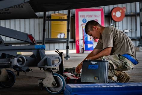 Lockheed Martin F-22 Raptor maintenance with open avionics bays