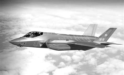 Lockheed Martin F-35 Lightning II flying alongside US Air Force aircraft