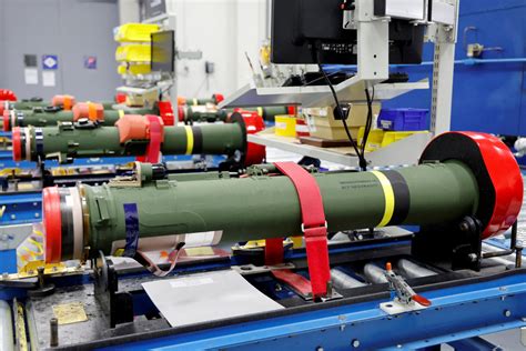 Lockheed Martin missile production line factory workers assembling interceptors