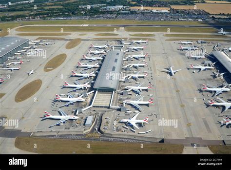 London Heathrow Airport aerial British Airways aircraft busy runway operations