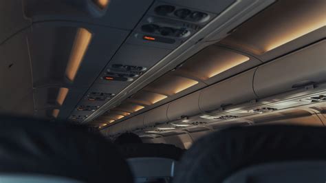 long-haul aircraft cabin lights dimmed for sleep