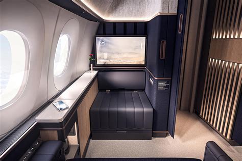 long haul premium cabin passenger working laptop business class ultra long flight