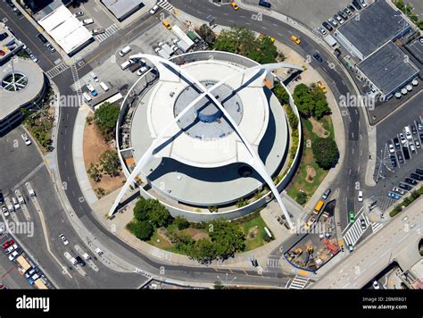 Los Angeles International Airport iconic Theme Building with aircraft taxiing nearby