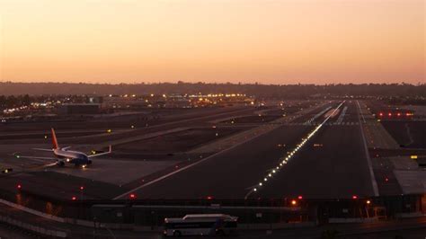 Los Angeles International Airport nighttime aerial highlighting international terminal
