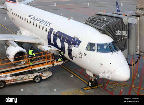LOT Polish Airlines Embraer E170 taking off from Warsaw Chopin Airport