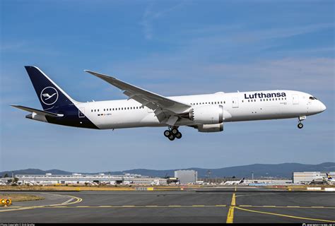 Lufthansa 787 Dreamliner at gate next to a 747-8 in early morning light